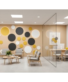 Panneaux muraux acoustiques ronds Luna en noir, blanc et jaune installés dans une salle d’attente moderne et lumineuse.